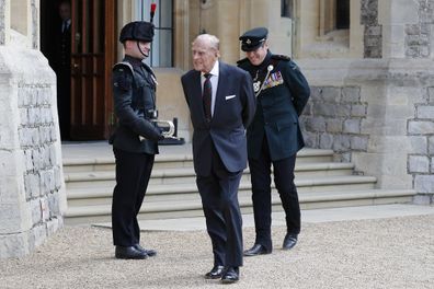 Prince Philip flanked by Assistant Colonel Commandant, Major General Tom Copinger-Symeas (L) inspects buglers during the transfer.