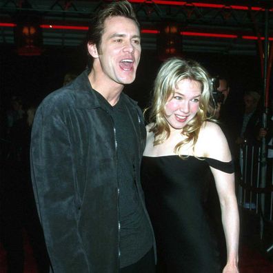 Jim Carrey arrives with girlfriend, actress Renee Zellweger at the Los Angeles Premiere of Man on the Moon in December 20, 1999.