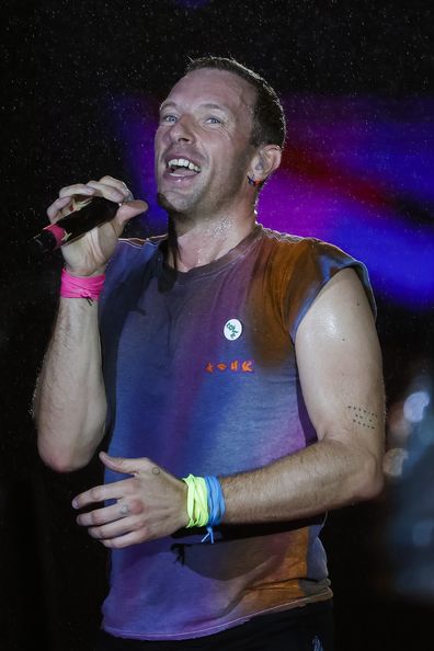 Chris Martin of the band Coldplay performs at the Mundo Stage during the Rock in Rio Festival at Cidade do Rock on September 10, 2022