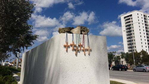 Six crosses are placed at a memorial on campus at the Florida International University last Saturday. (AAP)