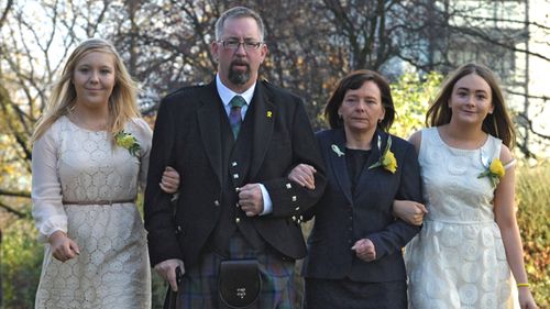Bethany Haines (left), Michael Haines, Barbara Henning and Lucy Henning attend a memorial service for murdered British aid worker Alan Henning on November 22, 2014 in Manchester, United Kingdom. The 47-year-old taxi driver was captured in December while delivering food and supplies to Syrian refugees and was murdered by Islamic State militants in Syria. (Getty)
