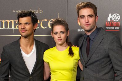 Actors Taylor Lautner, Kristen Stewart and Robert Pattinson attend the "The Twilight Saga: Breaking Dawn - Part 2" (La Saga Crepusculo: Amanecer Parte 2) premiere at the Kinepolis cinema on November 15, 2012 in Madrid, Spain.  (Photo by Carlos Alvarez/Getty Images)