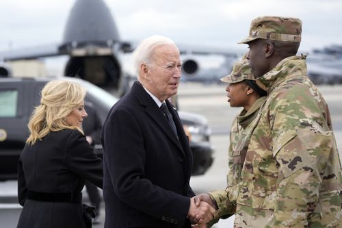 President Joe Biden and first lady Jill Biden greet service members before boarding Air Force One after attending a casualty return for Sgt. William Jerome Rivers, 46, of Carrollton, Ga., Sgt. Breonna Alexsondria Moffett, 23, of Savannah, Ga., and Sgt. Kennedy Ladon Sanders, 24, of Waycross, Ga., at Dover Air Force Base, Del., Friday, Feb. 2, 2024 