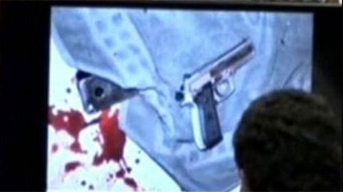 A handgun at the Oscar Pistorius crime scene.
