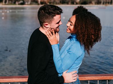 Young couple by the water