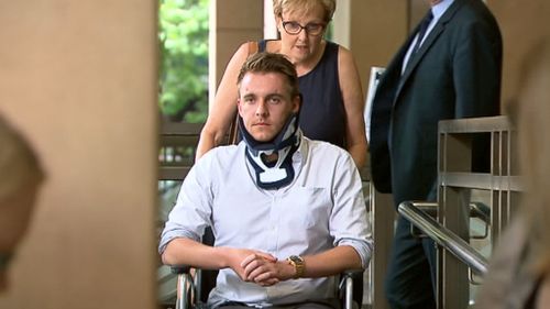 Thomas Charles Adamson being wheeled out of Melbourne Magistrates Court today (9NEWS)