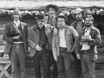 The cast of Butch Cassidy and the Sundance Kid (1969) from left to right: Timothy Scott as News Carver, Robert Redford as Sundance Kid, Ted Cassidy as Harvey Logan, Paul Newman as Butch Cassidy, Dave Dunlap, and Charles Dierkop as Flat Nose Curry.