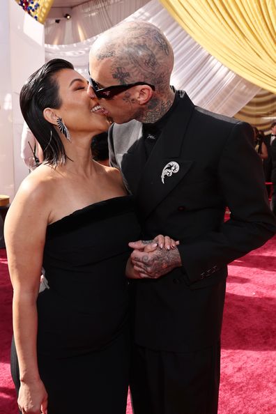 Kourtney Kardashian and Travis Barker at the Oscars 2022