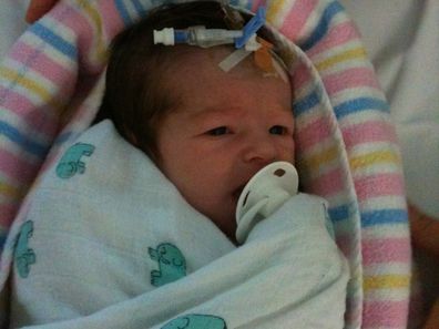 Eva Kalpidis as a baby in hospital.
