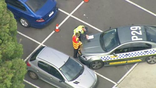Victorian police at the scene of the man's death. (9NEWS)
