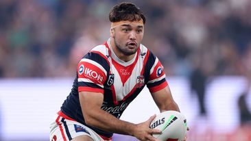 Roosters star Brandon Smith runs the ball.