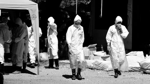 Forensic workers at the scene after the Boxing Day tusnami, which killed 5400 people in Thailand.