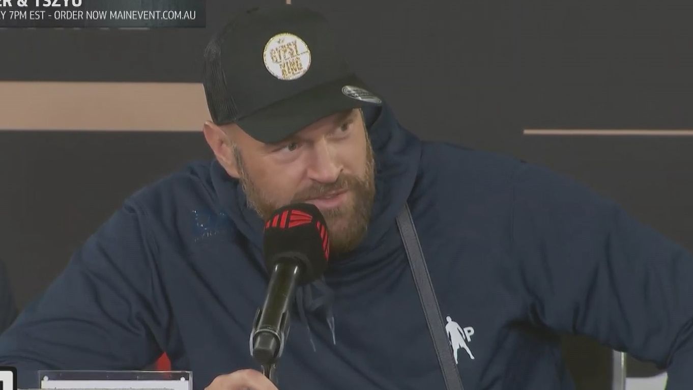 Boxing champion Tyson Fury promises Aussie fight after crashing press conference