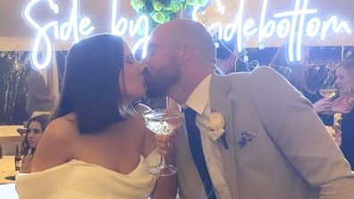 AFL star Steele Sidebottom has married his longtime partner Alisha Edwards.