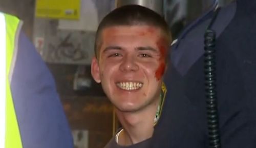 Daniel Callebaut, 18, appeared to be in high spirits despite having his hands cuffed. Picture: 9NEWS