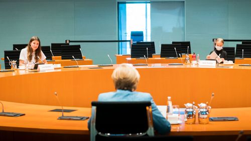 In this handout photo provided by the German Government Press Office (BPA), German Chancellor Angela Merkel meets Luisa Neubauer and Greta Thunberg in the international conference hall of the Federal Chancellery on August 20, 2020 in Berlin, Germany.