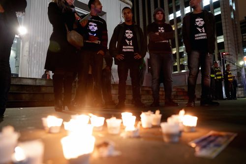 A candlelit vigil is held for the man who is second in the polls behind a former president who cannot run because he is behind bars.