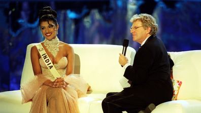 Miss India, Priyanka Chopra, 18, speaking with the host, Jerry Springer, during the Miss World contest at The Millennium Dome in Greenwich. 