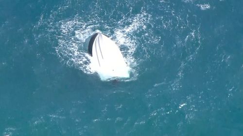 Three men rescued after their boat overturned near Mandurah