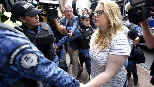 Cassie Sainsbury is led into a Bogota court in 2017