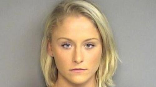 Woman charged for allegedly keying 'wore' into friend's car