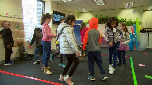 The program provides dynamic childcare inside the workplace. (9NEWS)