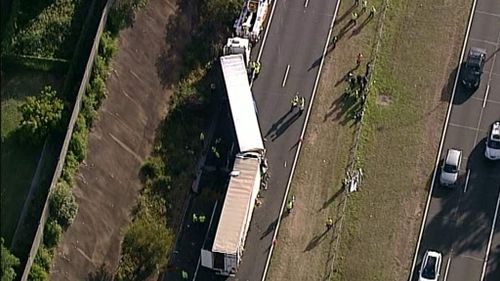 Sydney commuters are facing lengthy delays following a two-truck smash on the M2. (9NEWS)