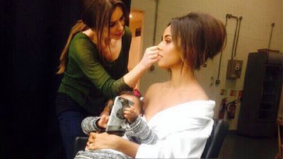 Rochelle Humes from The Singers holds her daughter while getting her hair done ahead of an appearance in 2015.&nbsp;