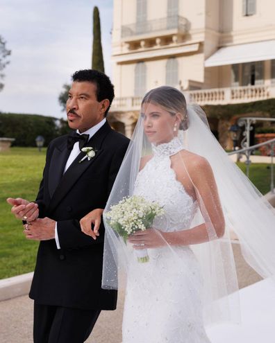 Lionel Richie was emotional as he walked his youngest child down the aisle.