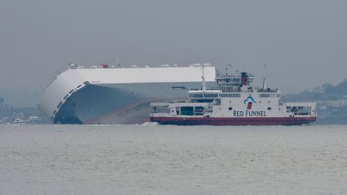 The Hoegh Osaka, a car carrier, became stranded on Bramble Bank, in the Solent between Southampton and the Isle of Wight. (AAP)