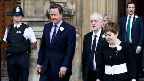 Britain's Prime Minister David Cameron walks from Parliament to St Margaret's Church with Jeremy Corbyn (AAP)
