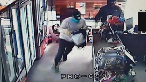News Melbourne bottle shop robberies hammer attacks masked men police hunting Victoria