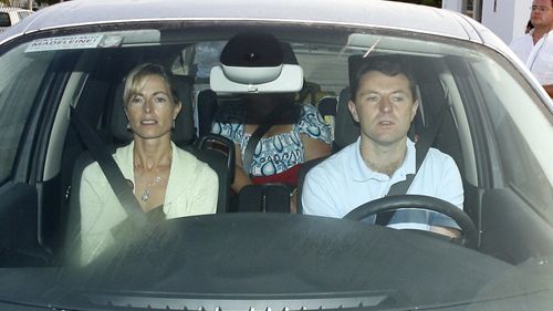 Kate and Gerry McCann, the parents of missing British girl Madeleine, are photographed in September 2007 in their car, heading for the airport.