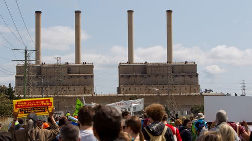 Clean Energy demonstrators march on Hazelwood Power Plant in Latrobe Valley, Victoria in October 2010. (AAP)