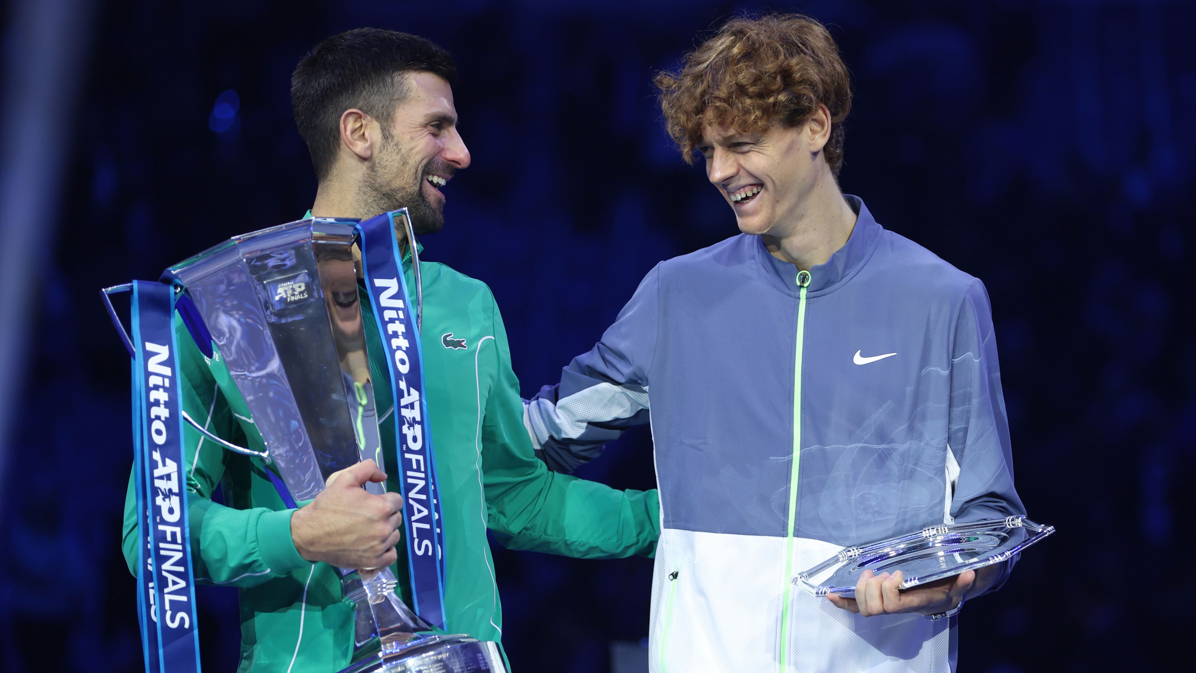 Novak Djokovic and Jannik Sinner of Italy during the trophy presentation at the ATP Finals.