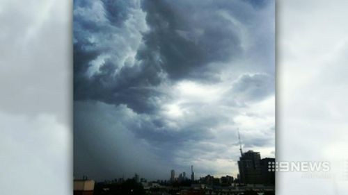 Melbourne CBD was plunged into darkness as clouds rolled in overhead. (9NEWS)