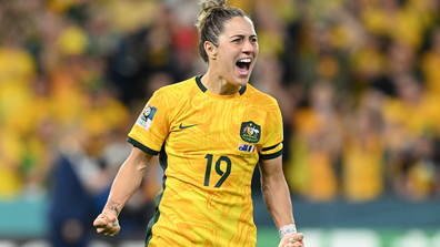 Katrina Gorry celebrates after scoring Australia's sixth penalty during the team's penalty shootout against France.