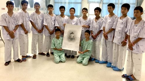 The boys sketched a tribute to the Thai diver who died during the mission. Picture: Supplied
