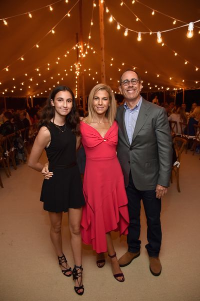 <p>In our memories television's Seinfeld was the perennial single but at a Net-a-porter event comedian Jerry Seinfeld showed that married life continues to suit him, sitting alongside his 16-year-old daughter Sascha.</p>
<p>The fresh-faced, petite brunette didn’t have to travel far with the party held in conjunction with the foundation GOOD+, which was created by Jerry’s wife of 20 years, Jessica Seinfeld, held at the family’s Hamptons estate.</p>
<p>For two weeks Net-a-porter has arranged a pick-up service for the premium customers in the US to donate children’s books and clothing.<br>
“Are there any women here who have heard of Net-a-port-er?” Jerry deadpanned to crowd according to <a href="http://wwd.com/eye/parties/jessica-seinfeld-dinner-net-a-porter-good-east-hampton-10954071/" target="_blank" draggable="false">WWD</a>.<br>
The event turned into a nostalgic television reunion with Suddenly Susan’s Brooke Shields, Sabrina the Teenage Witch’s Melissa Joan Hart and My Girls’s Anna Chlumsky supporting the stylish cause.</p>
<p>&nbsp;</p>