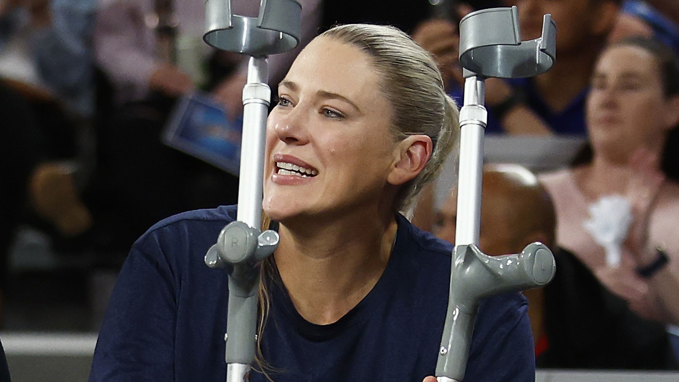 Lauren Jackson shows support for her team from the bench.