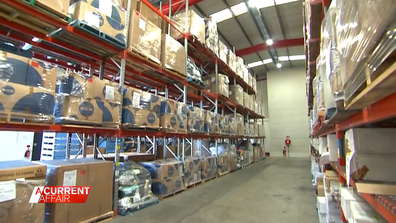 A warehouse is filled with items ready to be donated to flood impacted people in NSW and Queensland. 
