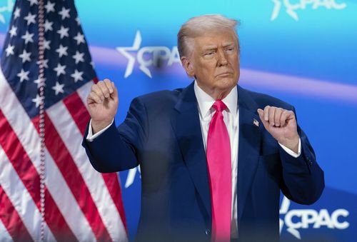 President Donald Trump dances after speaking at the Conservative Political Action Conference, CPAC, at the Gaylord National Resort & Convention Center, Saturday, Feb. 22, 2025, in Oxon Hill, Md. (AP Photo/Jose Luis Magana)