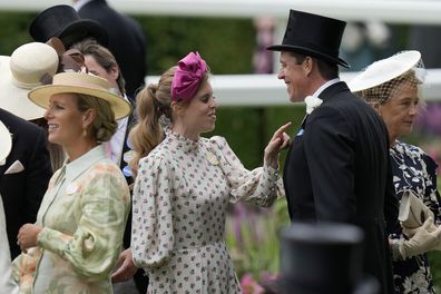 Princess Beatrice, centre, gestures as she arrives for day one of the Royal Ascot horse racing meeting, at Ascot Racecourse in Ascot, England, Tuesday, June 20, 2023