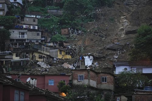 Damaged residences are seen after a landslide in Petropolis, Brazil, Wednesday, Feb. 16, 2022. 