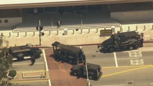 Armoured vehicles at the scene.