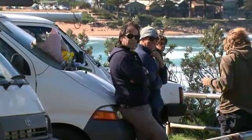 Residents today gathered at his vehicle to lay flowers and remember the popular local surfer, who has been described as 'iconic' in the community.