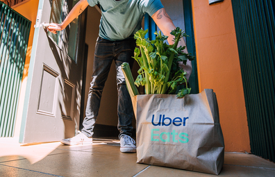 Uber Eats home delivers Woolworths groceries