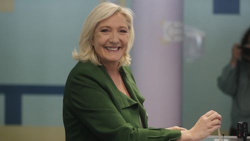 French far-right leader Marine Le Pen casts her ballot for the first round of the parliamentary elections.
