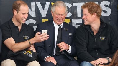 Prince William and Prince Harry share a laugh with father Prince Charles at the Invictus Games, 2014