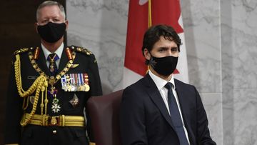 Chief of Defence Staff Jonathan Vance, left, and Canadian Prime Minister Justin Trudeau.